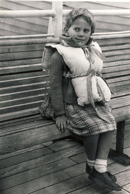Meyer family child with life jacket on board the S.S. Waterman. Canadian Museum of Immigration at Pier 21 (DI2013.1558.21).