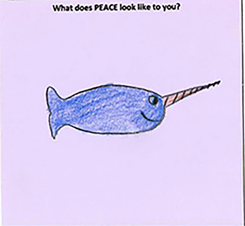 A light pink piece of paper with a drawing of a fish in blue color.