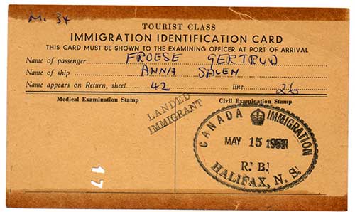 Old copy of a brown colored identification document.