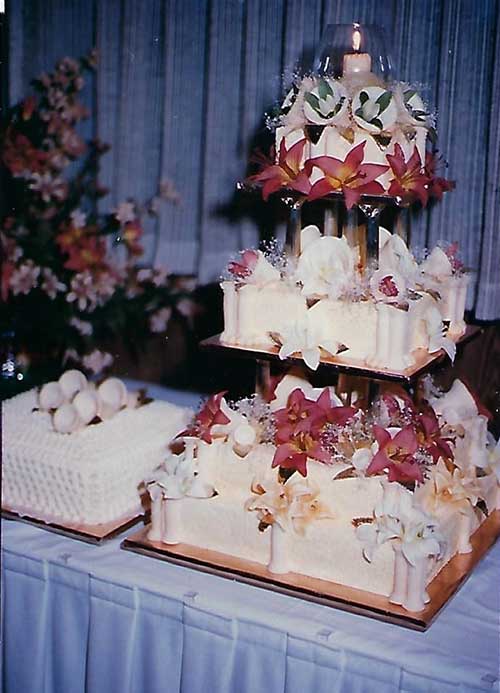 A beautiful three-tiered wedding cake.